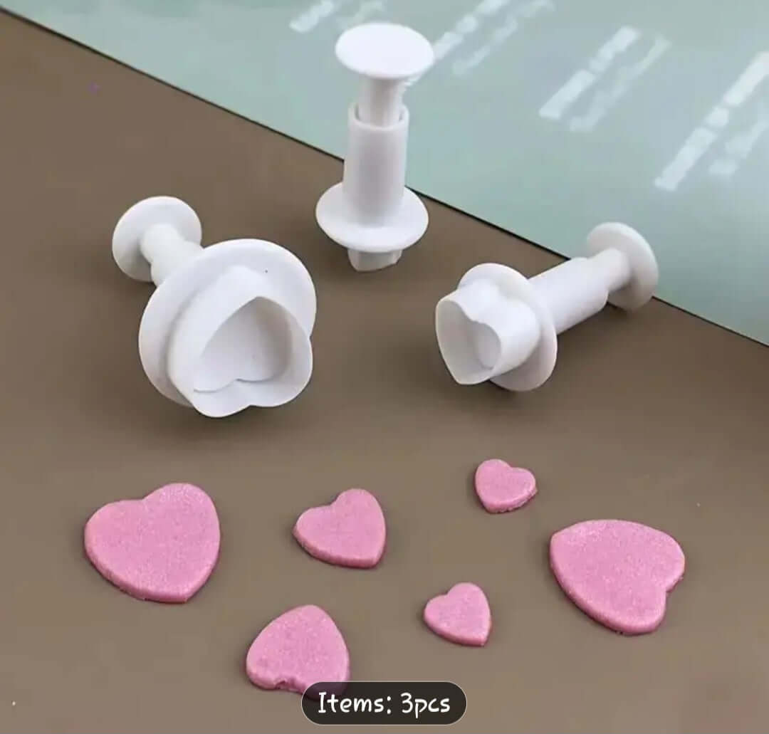 Cutter Heart Plunger Cutter set with three heart-shaped cutters and fondant, perfect for cake decorating and baking supplies.