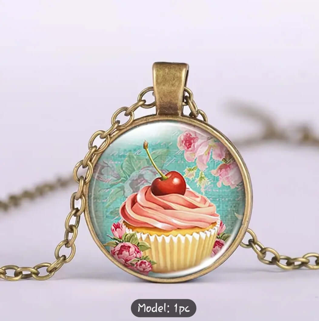 Jewelry Vintage Cupcake Pendant Necklace featuring a charming cupcake design with cherry on top.